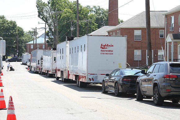 Production trucks line Calhoun Street in Richmond’s Gilpin Court Tuesday where NBA star Kevin Durant, formerly of the Golden State ...