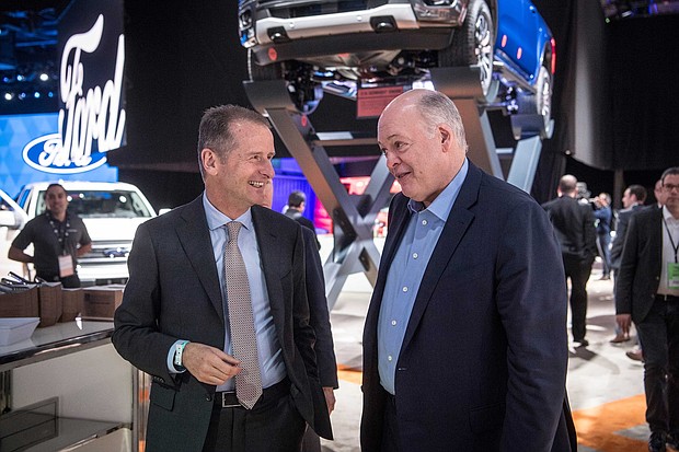 Volkswagen and Ford announced plans Friday to work closely to develop electric- and self-driving vehicles, the latest automakers to partner in the face of massive changes rocking the auto industry.