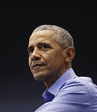 Former President Barack Obama penned a handwritten note to a former inmate to whom he granted clemency, praising her for making the dean's list at Southern University, where she enrolled after she left prison.