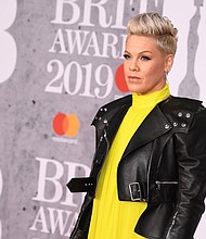 Pink had some strong words for those trying to mom-shame her after a photo she posted on Instagram Sunday elicited some critical comments.