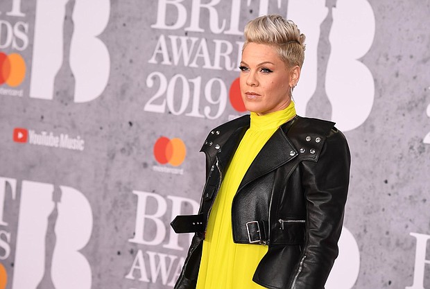 Pink had some strong words for those trying to mom-shame her after a photo she posted on Instagram Sunday elicited some critical comments.