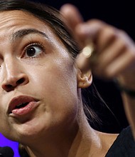 President Donald Trump denied Monday that the inflammatory tweets he issued Sunday were racist.