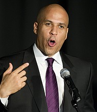New Jersey Sen. Cory Booker on Monday said President Donald Trump is "ripping at the fabric of our country for his own political gain" in response to the President's racist language attacking four progressive congresswomen.