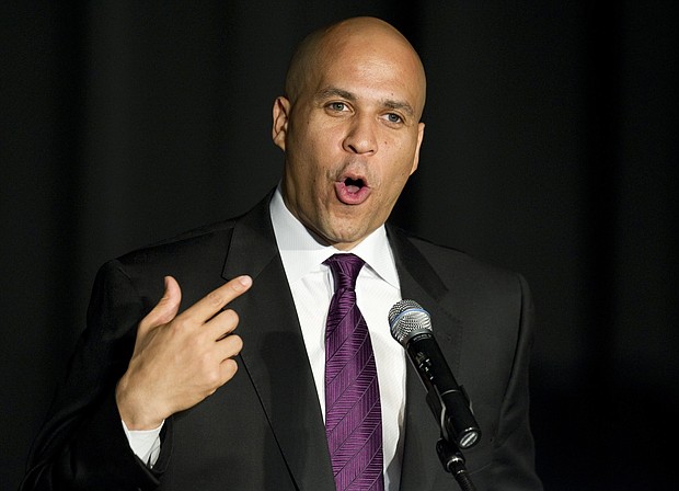 New Jersey Sen. Cory Booker on Monday said President Donald Trump is "ripping at the fabric of our country for his own political gain" in response to the President's racist language attacking four progressive congresswomen.