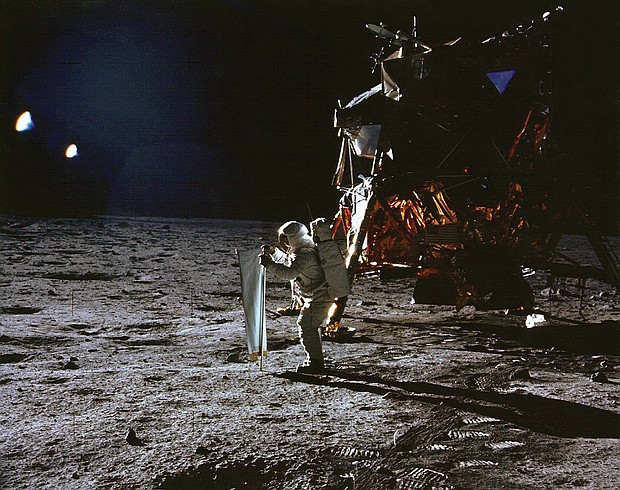 Astronaut Neil Armstrong, commander of the historic Apollo 11 mission, stands outside the lunar module called “Eagle” during the July 20, 1969, moon landing. Astronaut Buzz Aldrin took the photograph with a Hasselblad 70mm camera. Because Mr. Armstrong took most of the photos as the astronauts worked on the lunar surface, this is one of the few showing Mr. Armstrong on the moon.