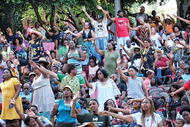 People enjoying the 10th Annual Gospel Music Festival on Sunday at Dogwood Dell. The free event was hosted by Sheilah Belle and Praise 104.7 FM as part of the City of Richmond’s Festival of Arts. (Sandra Sellars/Richmond Free Press)