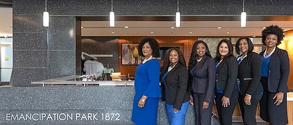 Lucy Bremond, Emancipation Park Conservatory Executive Director, and staff