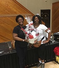 Left to Right:
Ms. Lockett, lucky winner of  the Le Bourriche basket giveaway & Trinette Wilson, Owner of Le Bourriche Bar & Gifts at The Holiday Marche’ 2018