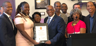 Mayor Bernard “Jack” Young presents a citation to Lady Brion Gill at a press conference to announce the creation of ... Mayor Bernard “Jack” Young presents a citation to Lady Brion Gill at a press conference to announce the creation of ...