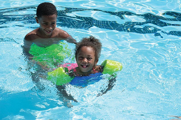 Kiana Robinson and Dashon Roberts Sr. enjoyed a family outing at the city’s Blackwell Pool in South Side.