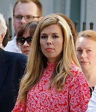 Boris Johnson and his girlfriend Carrie Symonds will be moving into Downing Street on Monday, the new UK prime minister's spokeswoman has said.