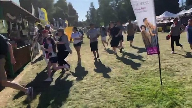 A screengrab taken from video and uploaded to twitter appears to show people scrambling at the Gilroy Garlic Festival.