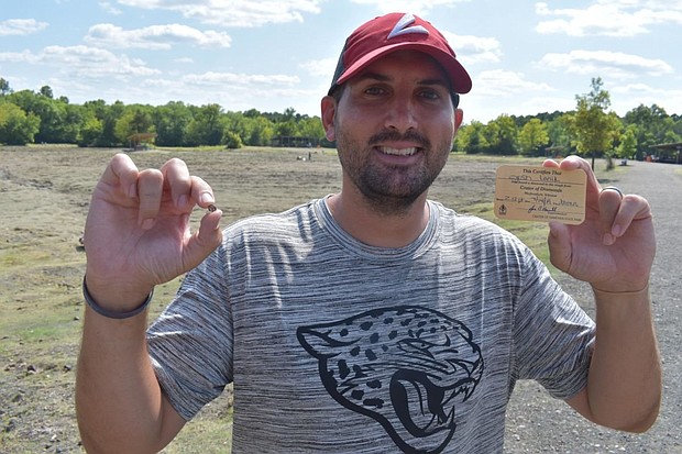 Josh Lanik, 36, was vacationing with his family when he discovered a brandy-colored gem at Crater of Diamonds State Park in Murfreesboro, Arkansas.