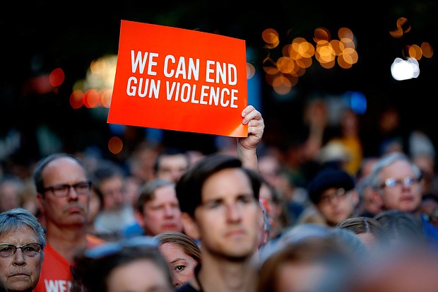 The same day that a gunman opened fire on an early-morning crowd in a Dayton, Ohio, nightlife district, residents attending a vigil for the victims of the shooting shouted at Gov. Mike DeWine to "do something."