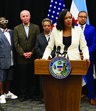 During a recent press conference, Chicago Public Schools CEO Janice Jackson (pictured at podium) announced that 10 schools would be added to the Opportunity Schools program for this upcoming school year. Photo Credit: Chicago Public Schools