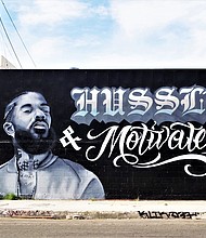 Hussle & Motivate was the motto of the slain rapper Nipsey Hussle, tribute mural near the end of LA’s Arts District on Violet Street near Mateo St. (photo via flickr.com)