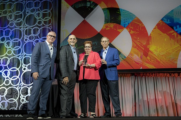 Tourism professional Shelley Johnson of Lake Charles, La., was recently inducted into the Destinations International Hall of Fame at the association’s annual convention. Don Welsh, President & CEO of Destinations International (left) honored Johnson along with Paul Arrigo, President & CEO of Visit Baton Rouge (middle left); and Steve Moore, president & CEO of Visit Phoenix (right).