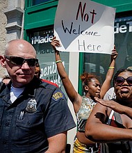 Trump supporters are not welcome on Wednesday near the site of the weekend mass shooting in Dayton, Ohio’s Oregon District where nine people were killed and 14 wounded. Hundreds of people protested the president’s visit to the city Wednesday.