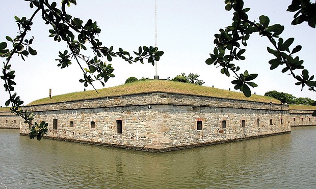 This June 11, 2008, file photo shows some of the fortifications inside the moat at Fort Monroe in Hampton. Casemate Museum historian W. Robert Kelly is working to 'humanize those enslaved' at Fort Monroe — one name at a time.