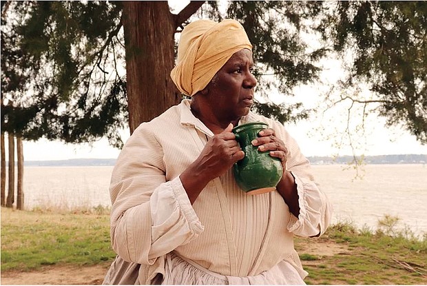 Interpreter Valarie Holmes portrays Angela, one of the first enslaved Africans to arrive in Virginia, at Historic Jamestowne.