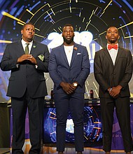 From left, Norfolk State University Coach Latrell Scott takes the stage at the recent MEAC banquet with linebacker Nigel Chavis and quarterback Juwan Carter.