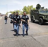Police near the scene of a mass shooting at a WalMart in El Paso
