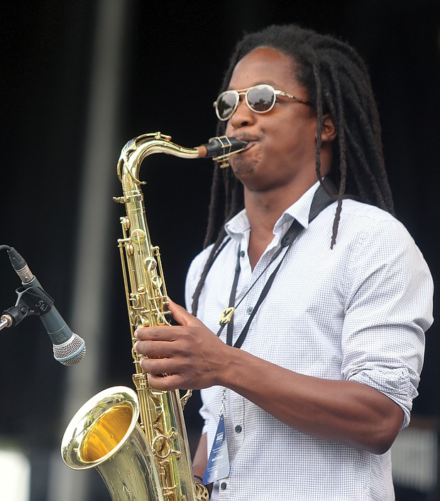 The saxophonist from the Richmond- based brass ensemble Brunswick blows during a number on Saturday at the 10th Annual Richmond Jazz and Music Festival at Maymont.