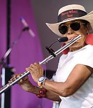 Sherry Winston, who has played the flute since age 11, gets into a mellow groove on Sunday at the 10th Annual Richmond Jazz and Music Festival at Maymont.