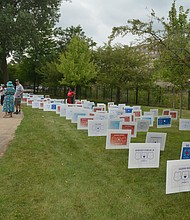 Signs lined the lawn bearing the names of Fallen Firefighters