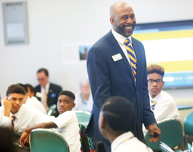 Corey Taylor, principal of Cristo Rey Richmond High School, welcomes members of the school’s inaugural class Monday and sets expectations for the academic year.