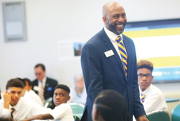 Corey Taylor, principal of Cristo Rey Richmond High School, welcomes members of the school’s inaugural class Monday and sets expectations for the academic year.