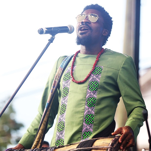 A ‘Down Home’ good time/
Music, food, entertainment and fun were the key ingredients last Saturday for the 29th Annual Down Home Family Reunion at Abner Clay Park in Jackson Ward. Hundreds of people turned out to enjoy the free event, hosted by the Elegba Folklore Society to celebrate African-American folk life. Drummer and vocalist Jah Baba, above, blends African rhythms and jazz during his performance. Originally from Nigeria, the musician said he now moves between the music scene in the United States and in Benin. (Regina H. Boone/Richmond Free Press)