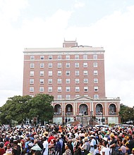 Hundreds of people amass for the National Park Service’s bell-ringing ceremony, a part of Sunday’s Healing Day events at Fort Monroe. (Regina H. Boone/Richmond Free Press)