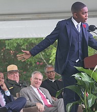 Brycen Dildy, 11, of Larkspur Middle School in Virginia Beach, wows the crowd as he speaks during last Saturday’s main commemoration ceremony at Fort Monroe. (Regina H. Boone/Richmond Free Press)