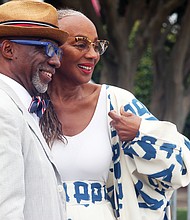 Susan Taylor, former editor-in-chief of Essence magazine, poses for a photograph on Sunday with Chester Williams of Newport News. She was among several celebrities who attended the weekend commemoration events. (Regina H. Boone/Richmond Free Press)