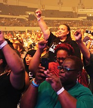 The crowd responds to Common during Saturday night’s performance, with many people rapping along with him. (Regina H. Boone/Richmond Free Press)