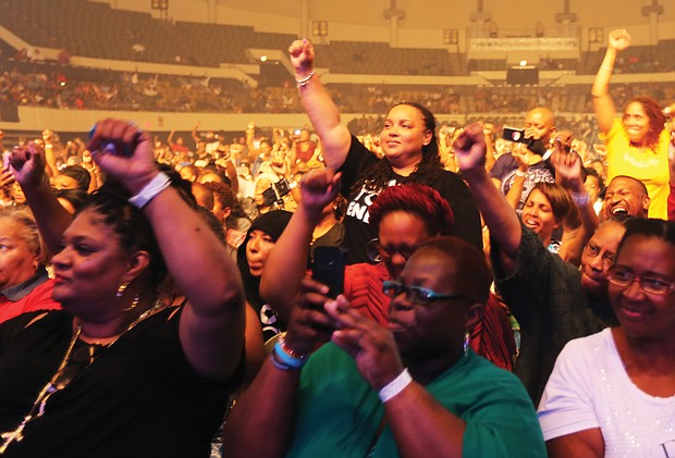 The crowd responds to Common during Saturday night’s performance, with many people rapping along with him. (Regina H. Boone/Richmond Free Press)