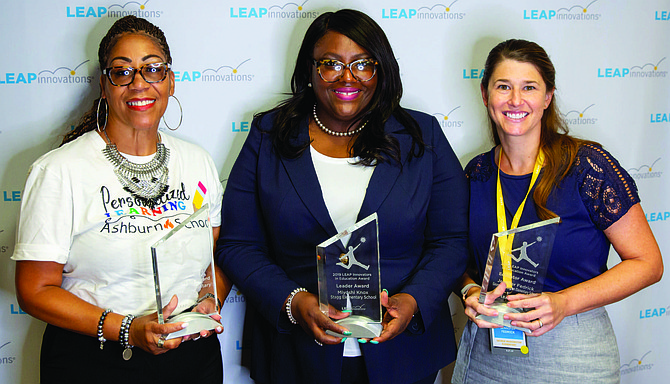 Miyoshi Knox (center), principal of Stagg School of Excellence in Englewood, recently received the LEAP Leader Award at the 2019 LEAP InnovatED Summit. Photo Credit: Ryan Moore Photography