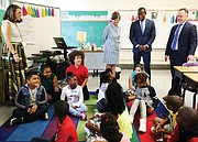 Teacher Abbie Radcliffe, standing at left, and her fourth-grade class at Westover Hills Elementary School welcome Principal Allison El Koubi, Richmond Mayor Levar M. Stoney and Richmond Public Schools Superintendent Jason Kamras on the first day of school.