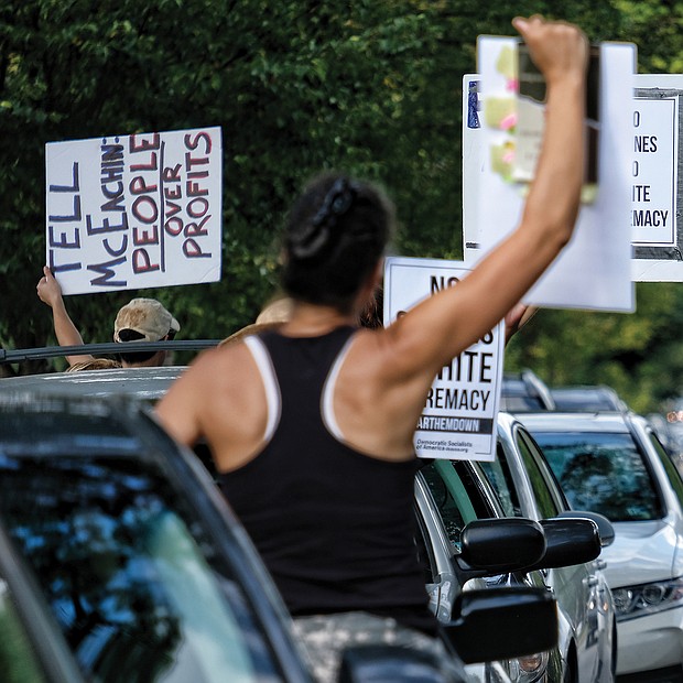Black Lives Matter activist Jalene Schmidt takes part in a protest last Sunday outside the national headquarters of the United Daughters of the Confederacy on Arthur Ashe Boulevard.