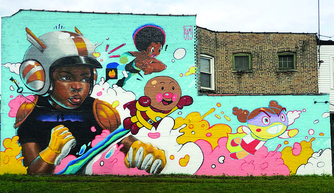 A new public mural titled “Rise as One” can be found at 1842 E. 79th St. thanks to an ongoing partnership between the Southeast Chicago Chamber of Commerce and AB Productions. Photo Credit: Courtesy of Kayla Mahaffey
