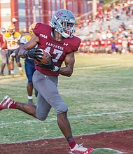 Virginia Union University’s Charles Hall snags a 74-yard pass from quarterback Khalid Morris and takes it in for a touchdown last Saturday in the Panthers’ game against Johnson C. Smith University at Hovey Field.