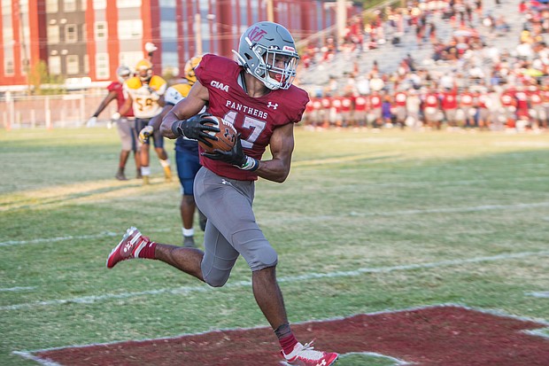 Virginia Union University’s Charles Hall snags a 74-yard pass from quarterback Khalid Morris and takes it in for a touchdown last Saturday in the Panthers’ game against Johnson C. Smith University at Hovey Field.