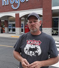 Brian Purcell stands empty handed Tuesday outside the Kroger store on Mechanicsville Turnpike in Hanover County. The founder of The Way food ministry made pickups from the store for a year but was cut off from the store’s donations of unsold food last month.