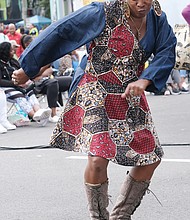 Thousands of people turned out for the 31st Annual 2nd Street Fes- tival last weekend, celebrating and remembering the history and legacy that gave the illustrious Jackson Ward street its renown as “Black Wall Street” and the “Harlem of the South.” The free, two-day event featured a variety of music, food and entertainment, including walking tours and a parade of fraternities, sororities, religious and benevolent organizations with connections to Jackson Ward.
Here, Terease Dixon dances to entertainment from one of four stages at the festival produced by Venture Richmond Events. (Sandra Sellars/Richmond Free Press)