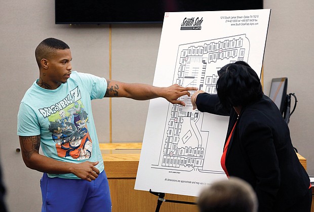 Joshua Brown, left, a neighbor of slain Botham Jean, testifies about the layout of the apartment complex during the murder trial of Amber Guyger in response to questions from Assistant District Attorney LaQuita Long, right. Mr. Brown was shot and killed Oct. 4.