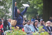 Feeling the spirit of the moment, Teddy Parham of Richmond responds to singer Joyce Johnson Rouse’s musical tribute “Standing on the Shoulders” during the ceremony.