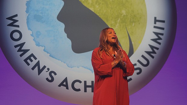 Entertainer Queen Latifah engages the crowd of more than 1,000 people Tuesday as the host of the Women’s Achieve Summit at the Greater Richmond Convention Center.