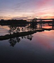 Sunset over the James River Downtown (Sandra Sellars/Richmond Free Press)