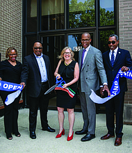 William W. Towns (fifth from the left), executive director of Benefit Chicago and adjunct lecturer of Social Impact at the Kellogg School of Management at Northwestern University, recently announced that Benefit Chicago would be investing $5 million into the Self-Help Ventures Fund. Photo Credit: Benefit Chicago